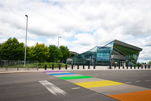 Exterior of CSE with the cross walk painted in pride colours