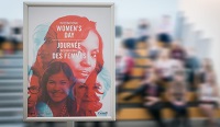 A poster with images of women and the words “International Women’s Day”.