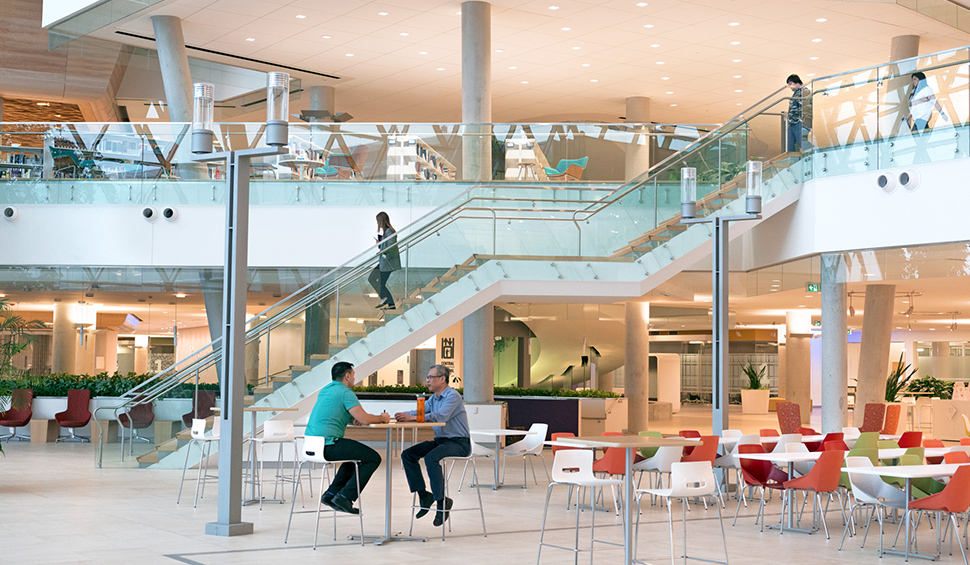 CSE cafeteria with two men in a meeting