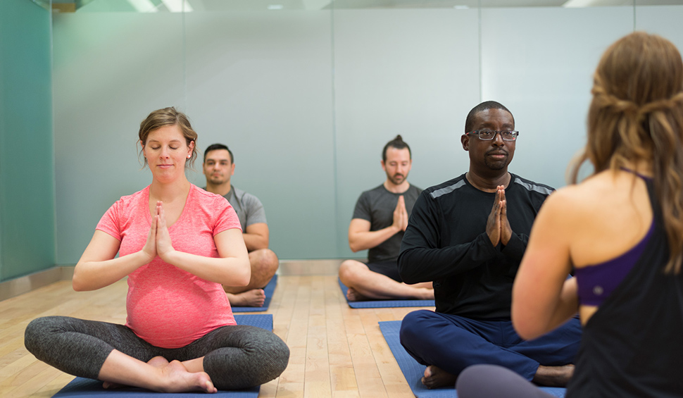 Group of CSE Employees in a yoga class held at CSE