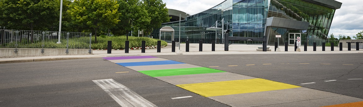 Rainbow crosswalk outside the Edward Drake Building.